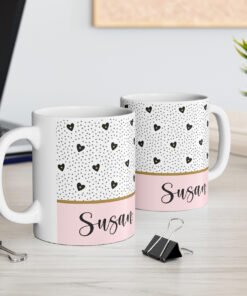 Monogram hearts mug on desk