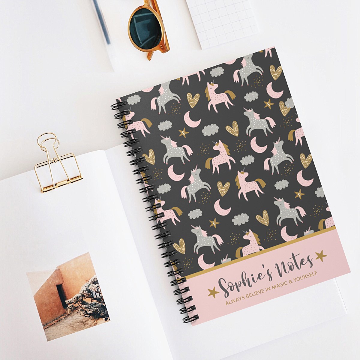 unicorn-notebook-black-desk